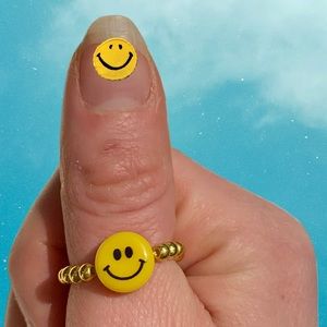 Beaded smiley face ring